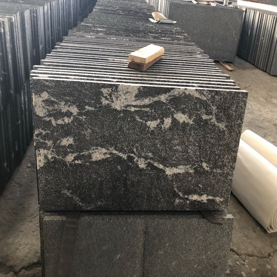 Snow grey granite tile.jpg